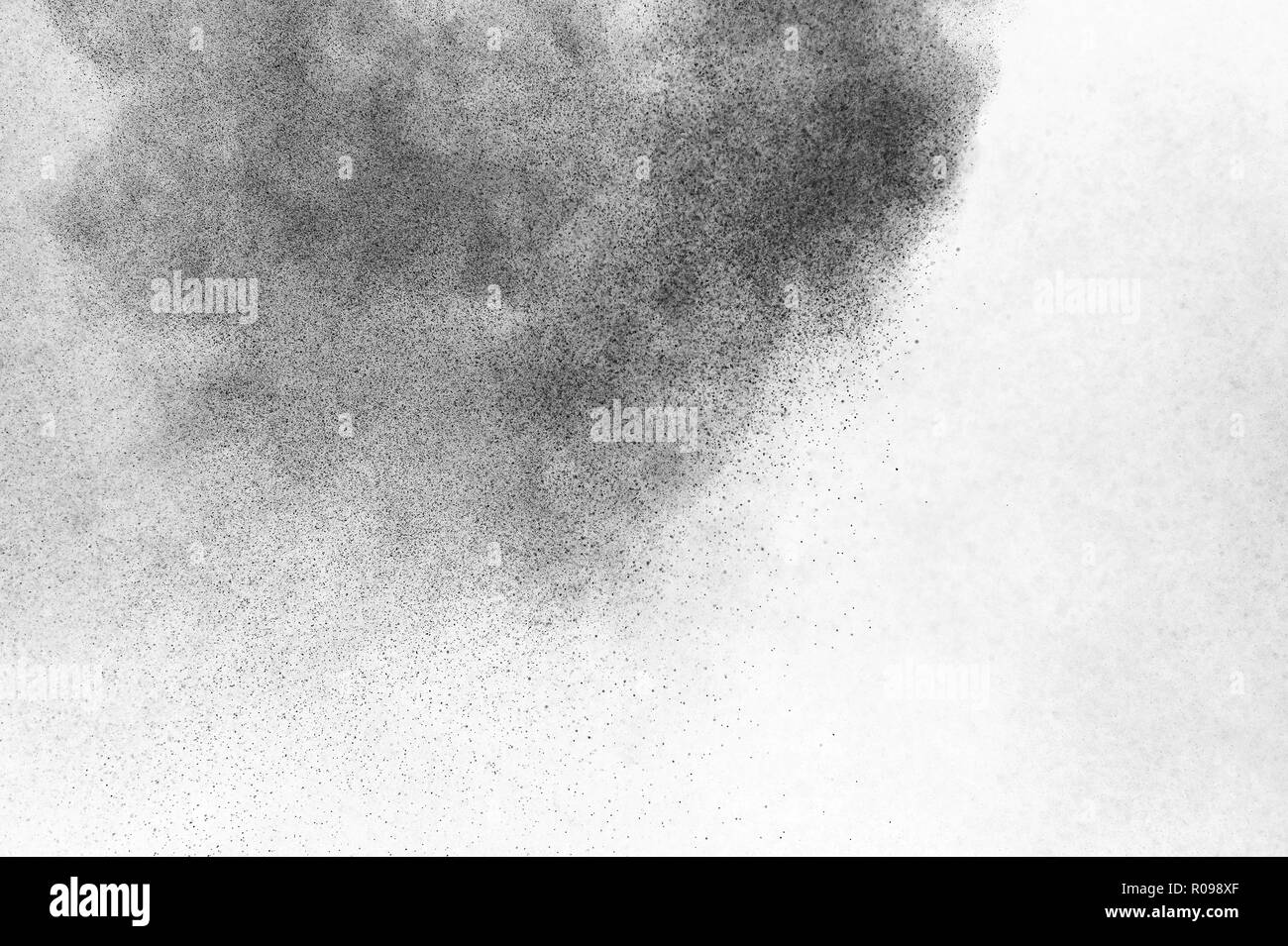 Black particles explosion isolated on white background. Abstract dust ...