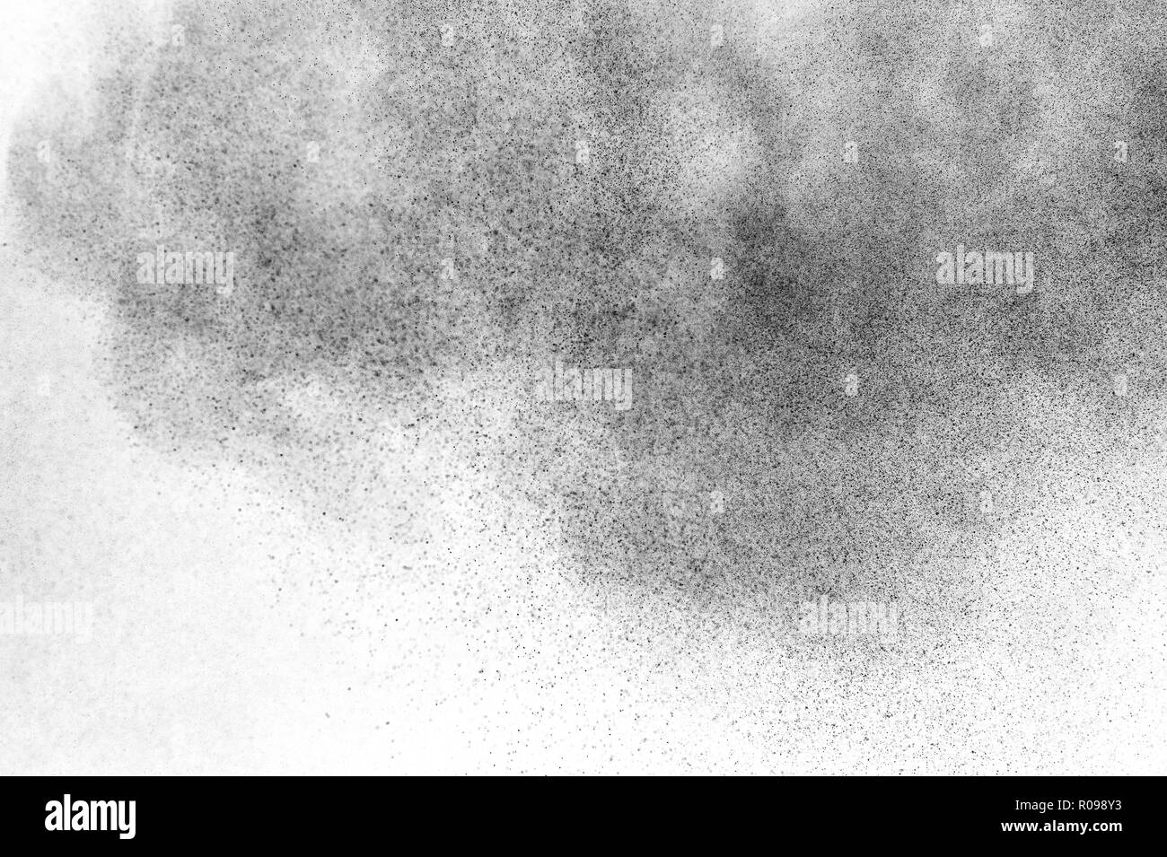 Black particles explosion isolated on white background. Abstract dust ...