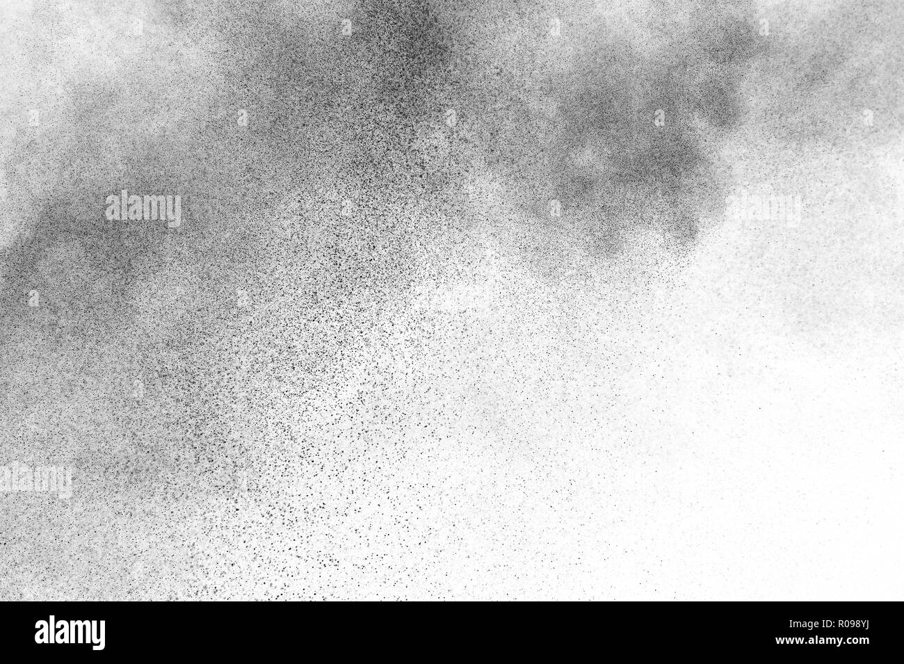Black particles explosion isolated on white background. Abstract dust ...