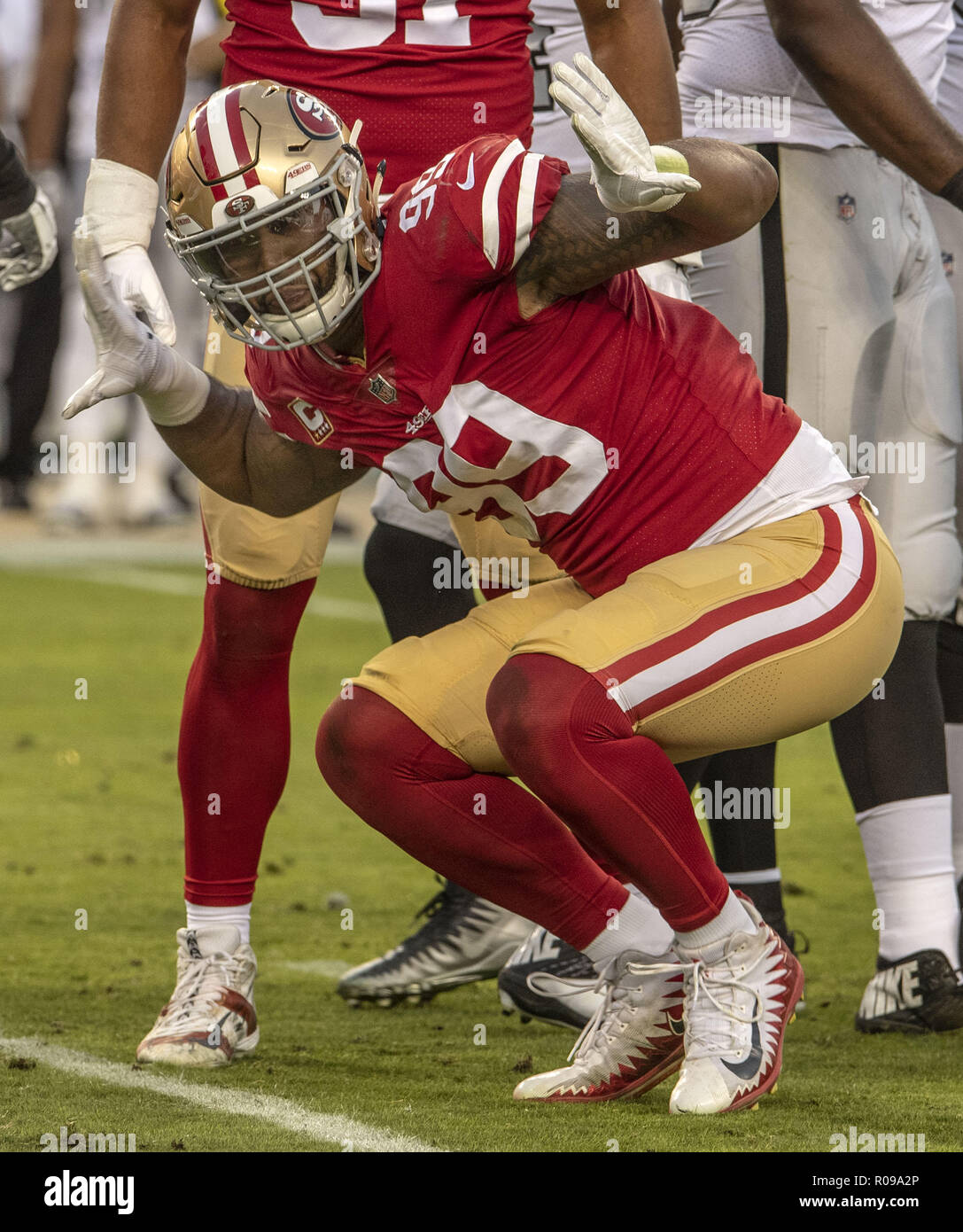 Miami Gardens, Florida, USA. 2nd Feb, 2020. San Francisco 49ers defensive  tackle DeForest Buckner (99) comforts San Francisco 49ers defensive end  Nick Bosa (97) after the Chiefs beat the 49ers 31-20 in