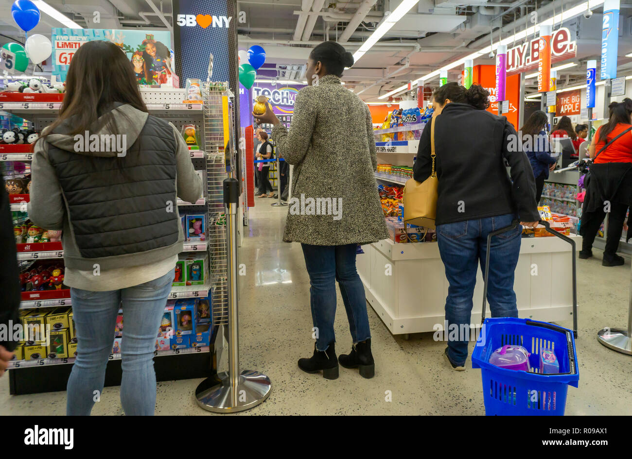 New York, USA. 2 November 2018. Shoppers invade the new Five Below discount store on prestigious Fifth Avenue in New York on its grand opening day, Friday, November 3, 2018, 2018. The 10,800 square foot location is the discounter's first in Manhattan and it is the chains 746th store. All the merchandise in the store, which ranges from clothing, to candy, to beauty supplies, and everything else in between is priced at $5 or less. Credit: Richard Levine/Alamy Live News Stock Photo