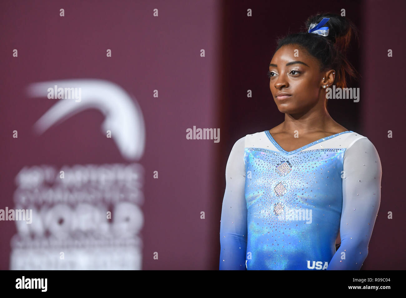 Doha, Qatar. 3rd Jan, 2016. SIMONE BILES stands on the awards podium during the Uneven Bars Event Finals competition held at the Aspire Dome in Doha, Qatar. Credit: Amy Sanderson/ZUMA Wire/Alamy Live News Stock Photo