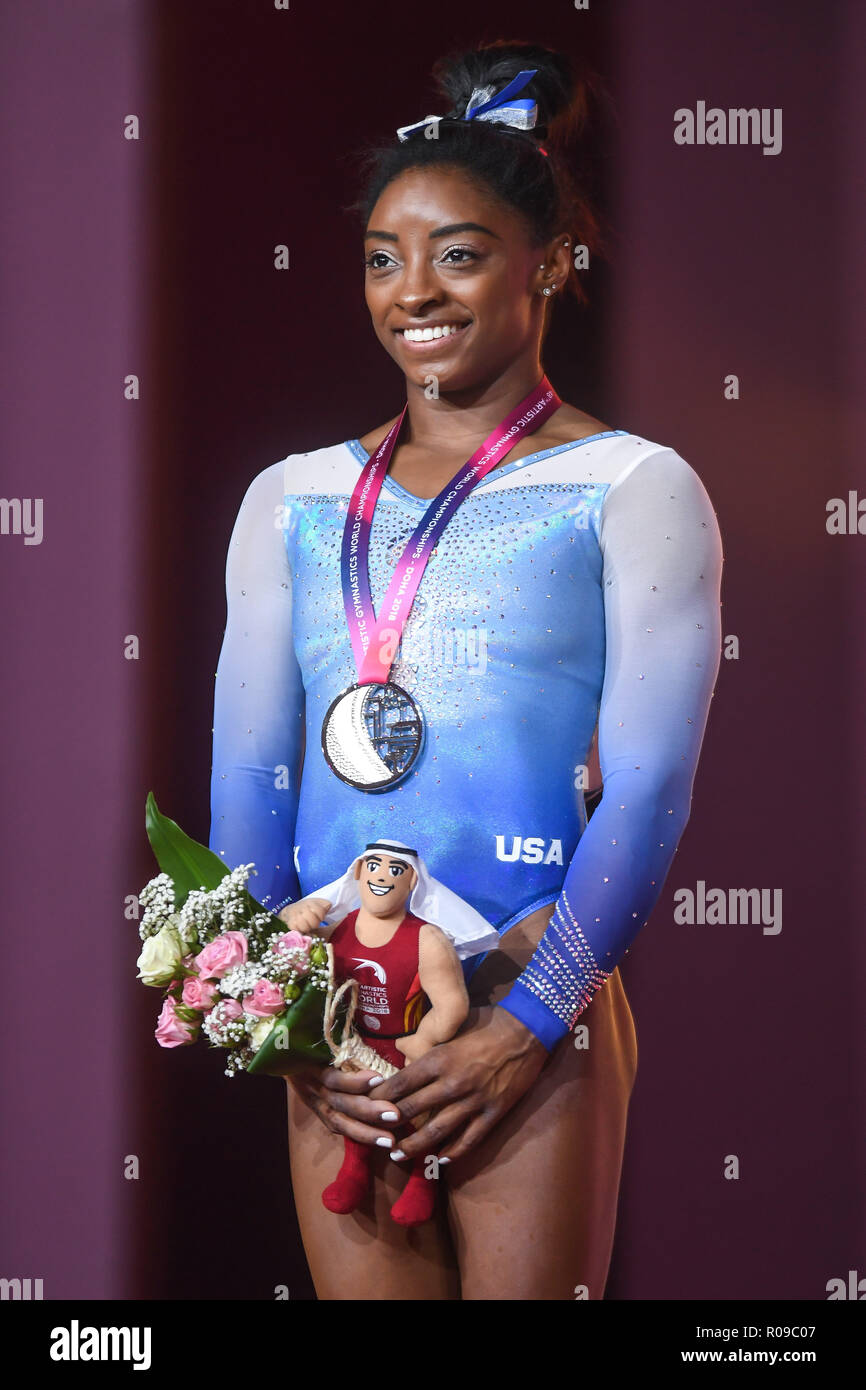 Doha, Qatar. 3rd Jan, 2016. SIMONE BILES poses for photographs during the Uneven Bars Event Finals competition held at the Aspire Dome in Doha, Qatar. Credit: Amy Sanderson/ZUMA Wire/Alamy Live News Stock Photo