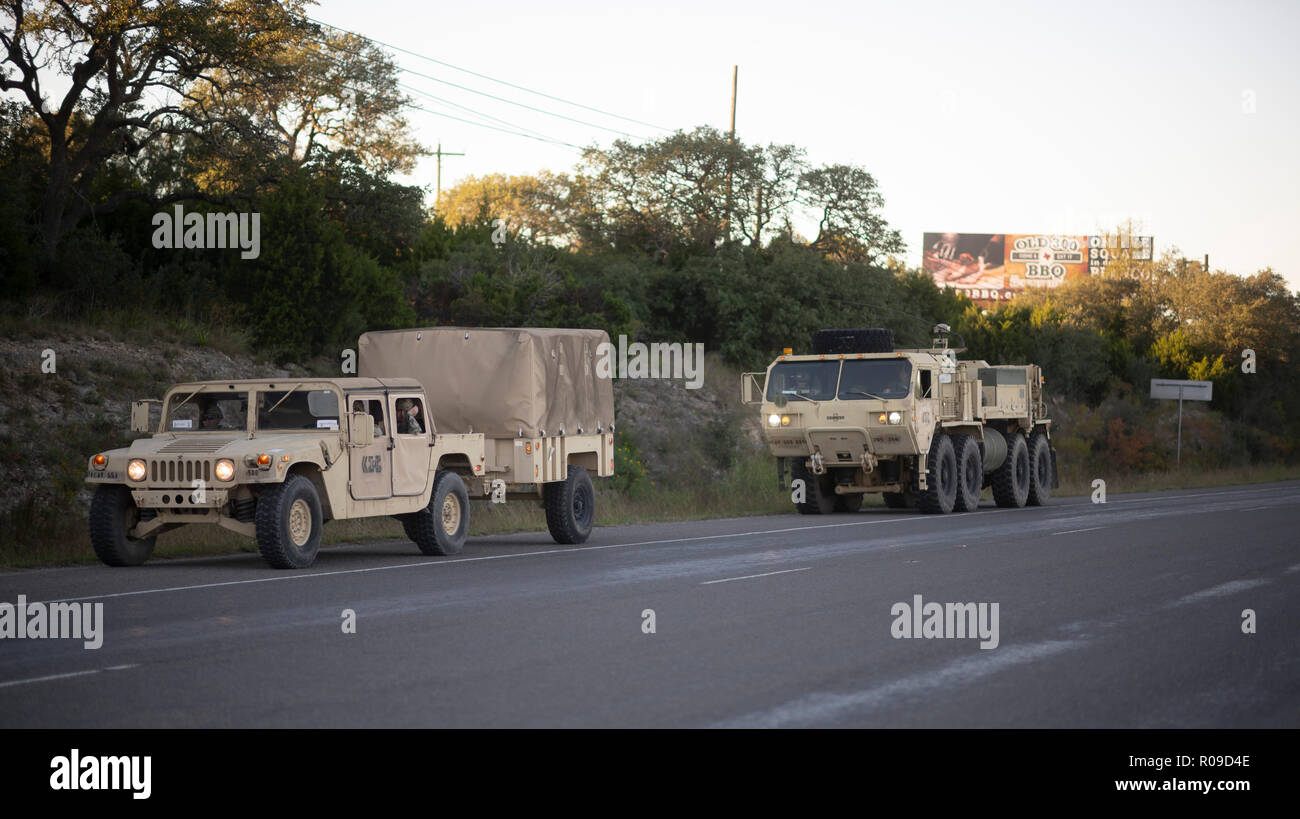 United States Army convoy carries troops and supplies to the U.S.-Mexico border on orders of Pres. Donald Trump. The president sent troops to the border in response to his perception of a group of refugees, fleeing violence and poverty in Honduras and trying to reach the relative safety of the United States, as a national security threat. Stock Photo