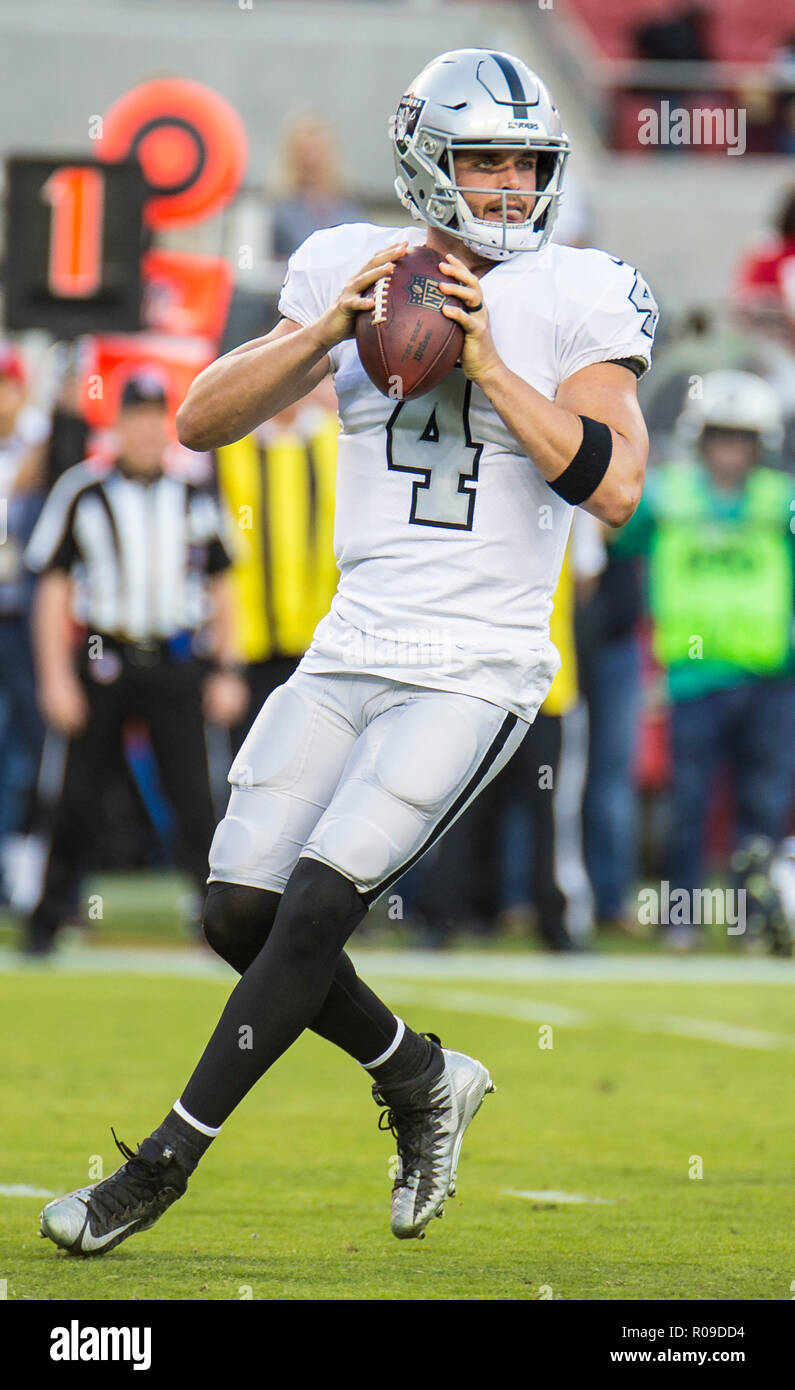 California, USA. 1 November 2018. Oakland quarterback Derek Carr (4) looks down field for an open receiver during the NFL Football game between Oakland Raiders and the San Francisco 49ers 3-34 lost at Levi Stadium Santa Clara Calif. Thurman James/CSM Credit: Cal Sport Media/Alamy Live News Stock Photo