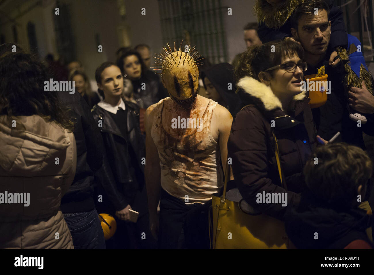 A Man Dressed Up As The Character Smiley From The Movie Smiley Poses For A Photo As He Takes Part In The Noche Del Terror Horror Night During Halloween Celebrations In The