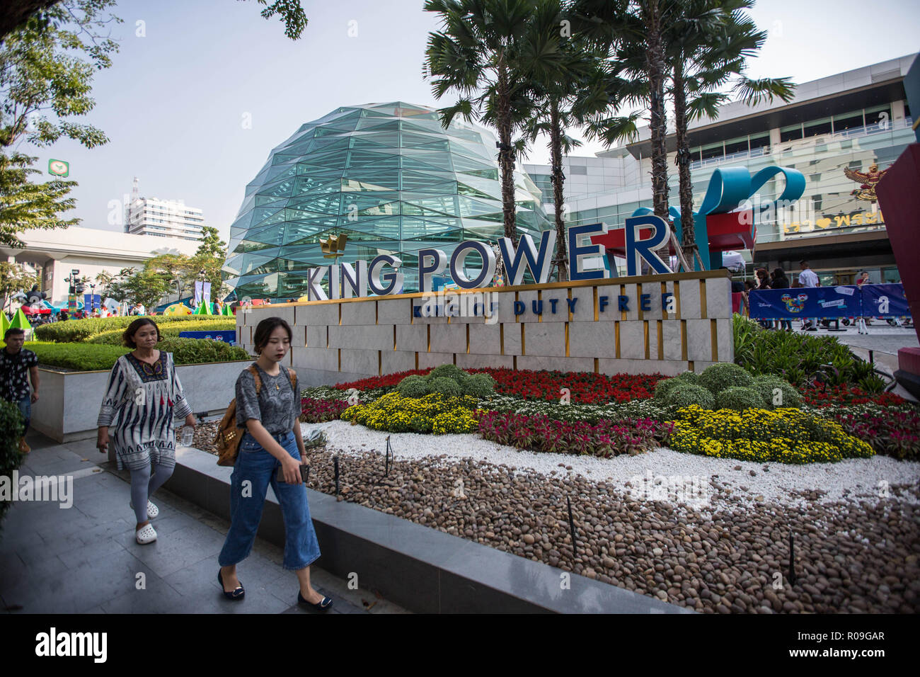 Bangkok, Thailand. 03rd Nov, 2018. People seen walking front of the King Power logo at the King Power Headquarter in Central Bangkok.  Thai billionaire Vichai Srivaddhanaprabha, Chairman of King Power died in a helicopter crash among four other people in the Premier League side's stadium car park on October 27, 2018 in Leicester City in the United Kingdom. Credit: SOPA Images Limited/Alamy Live News Stock Photo