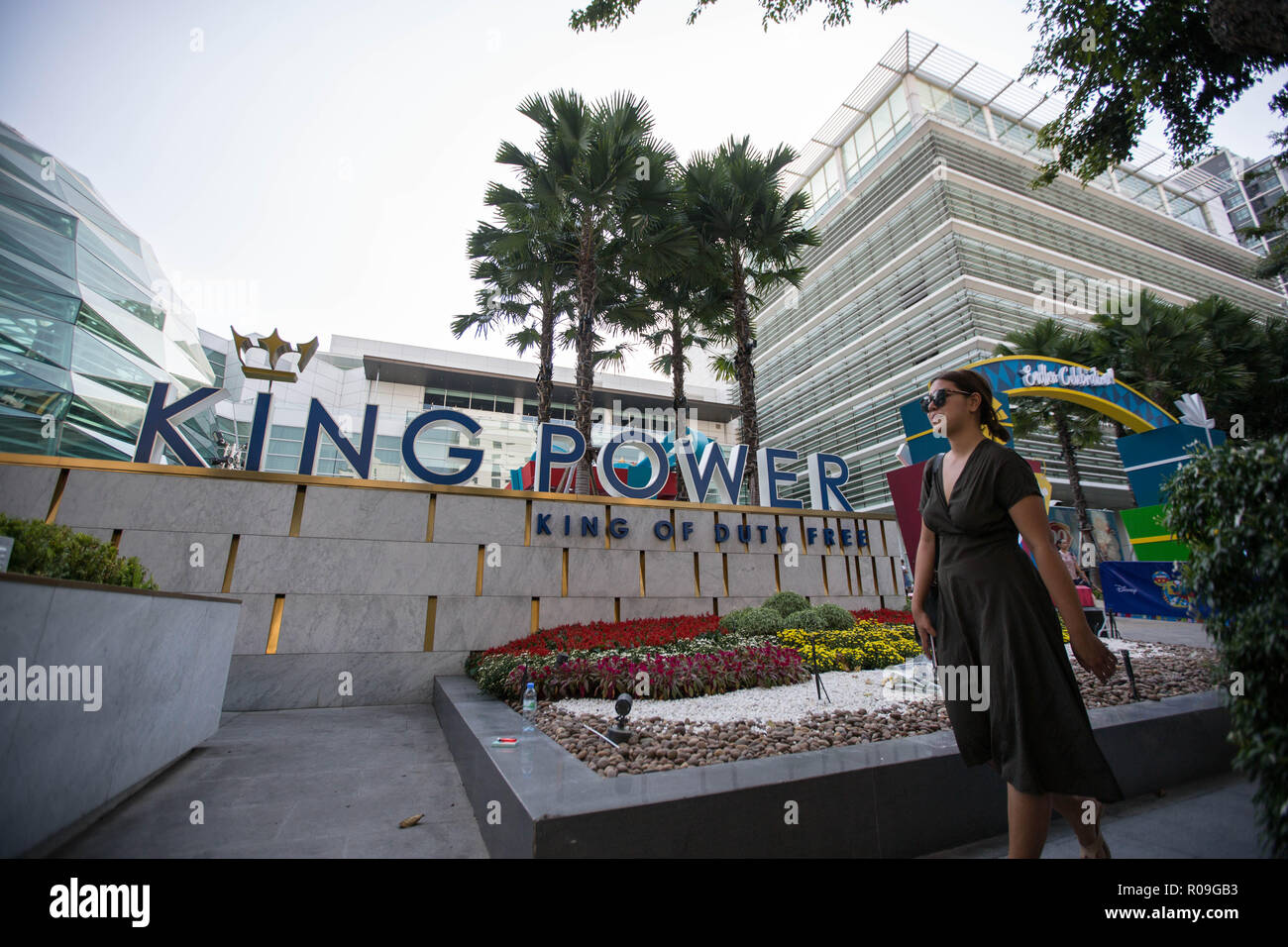 Bangkok, Thailand. 03rd Nov, 2018. A young lady seen walking front of the King Power logo at the King Power Headquarter in Central Bangkok.  Thai billionaire Vichai Srivaddhanaprabha, Chairman of King Power died in a helicopter crash among four other people in the Premier League side's stadium car park on October 27, 2018 in Leicester City in the United Kingdom. Credit: SOPA Images Limited/Alamy Live News Stock Photo