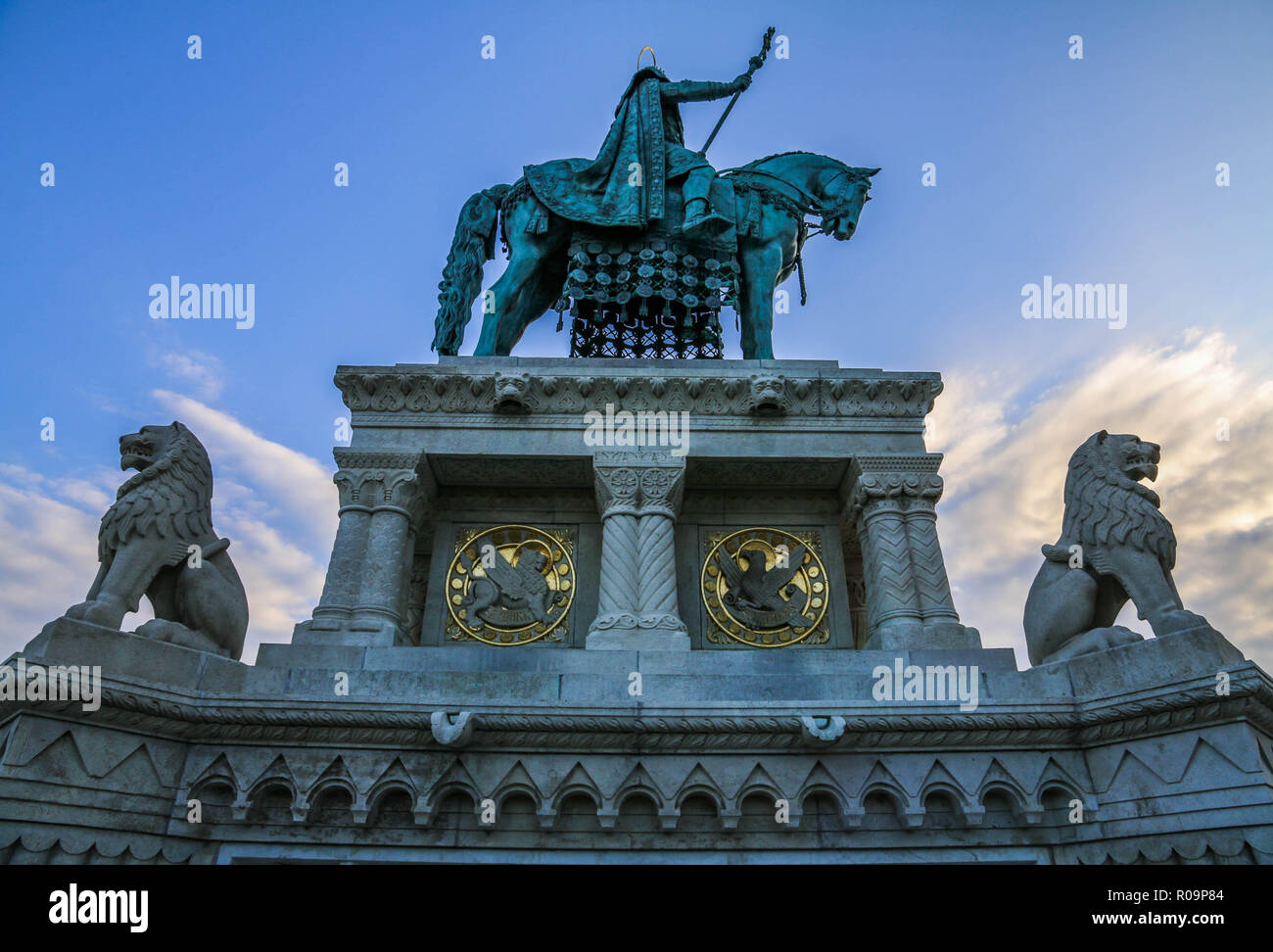 A bronze statue of Stephen I of Hungary mounted on a horse, erected in 1906, can be seen between the Bastion and the Matthias Church. Stock Photo