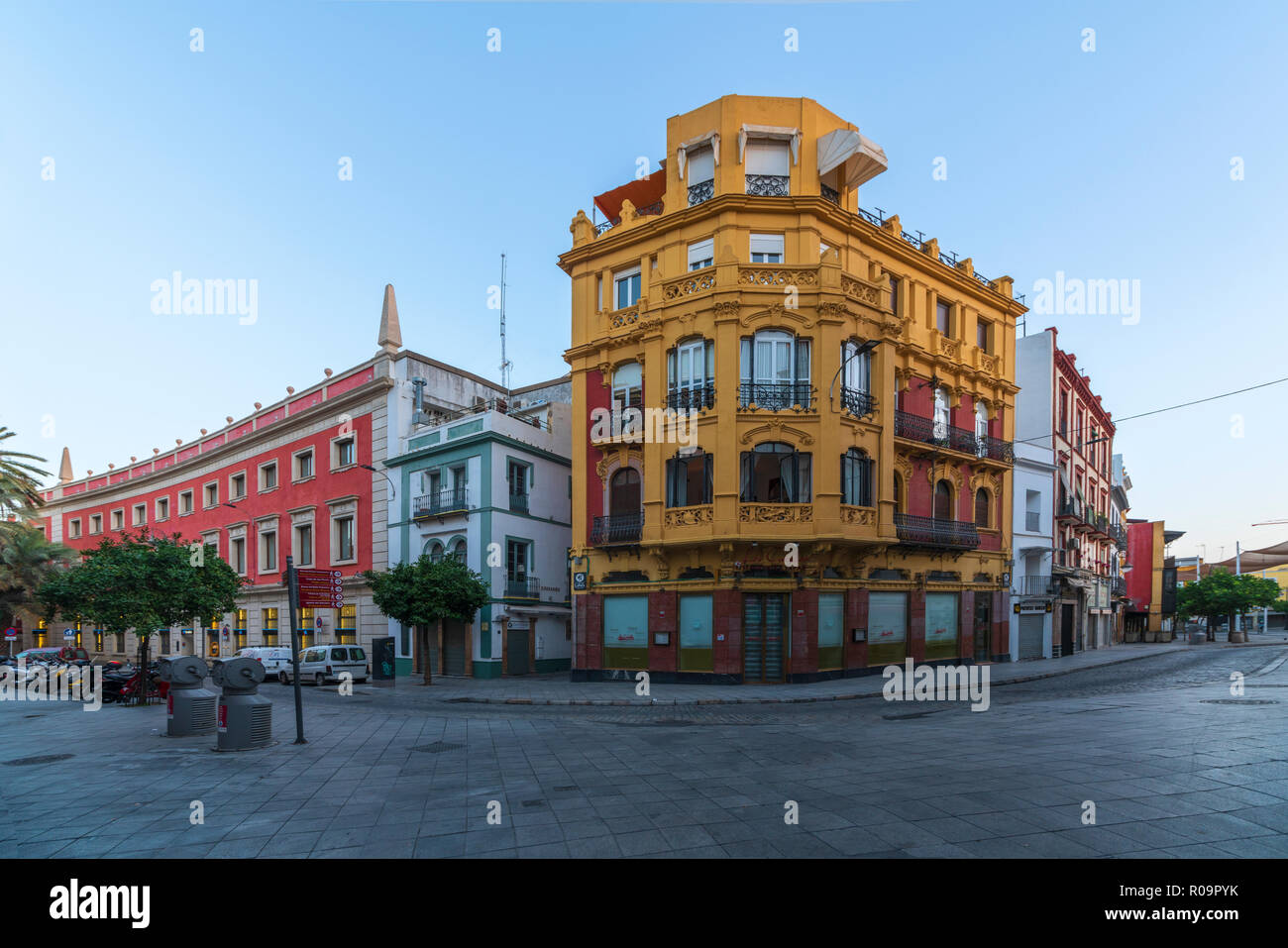 Colorful buildings in Art deco mixed with Baroque style in the neighborhoods of the historic center, Seville, Andalusia, Spain Stock Photo