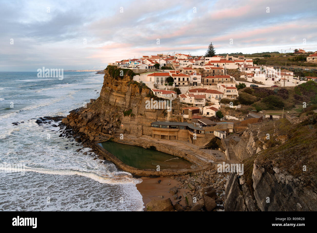 View of the Picturesque village Azenhas do Mar, on the edge of a cliff with a beach below. Landmark near Sintra, Lisbon, Portugal, Europe. landscape. Stock Photo
