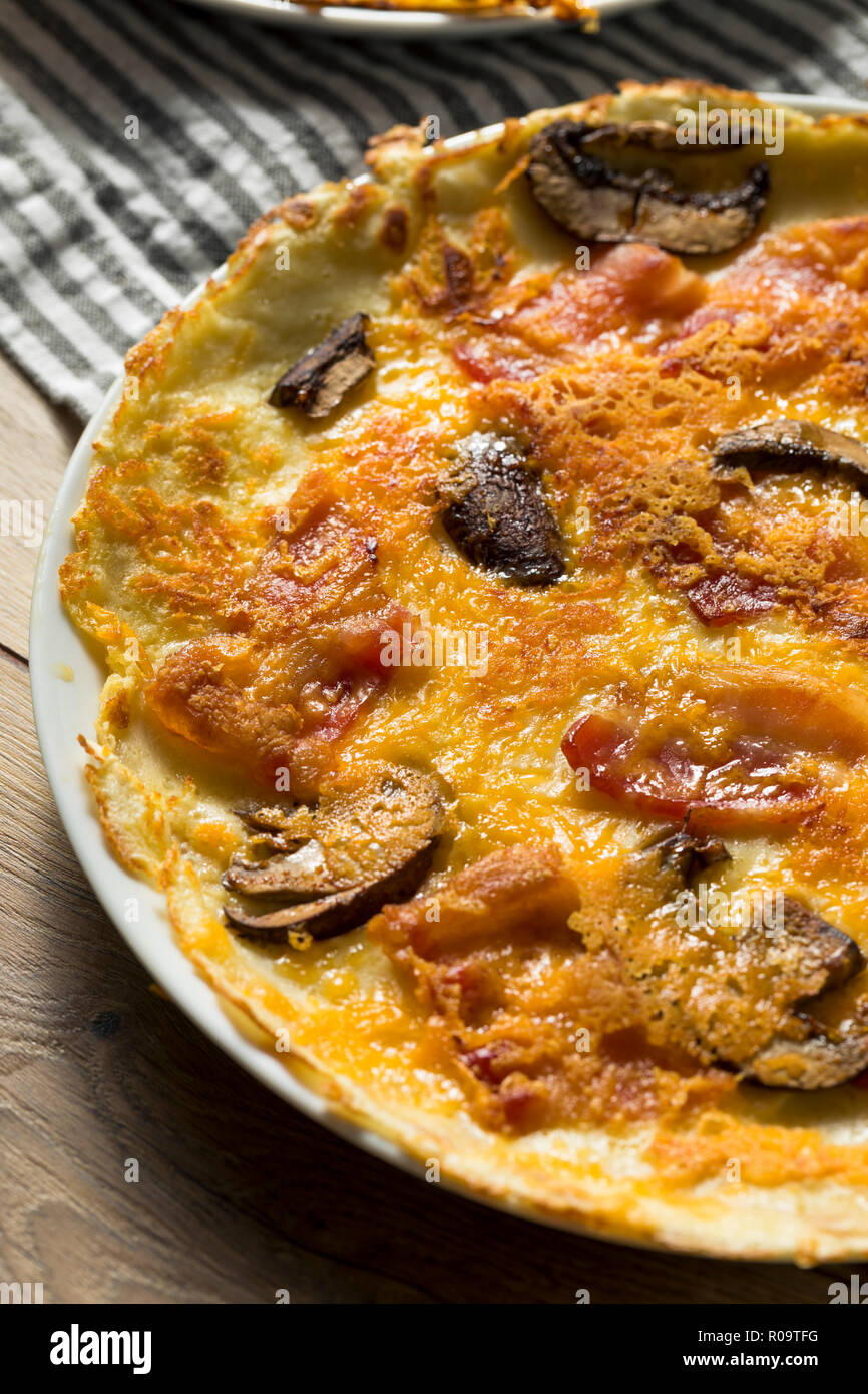 Savory Homemade Dutch Pannenkoeken Pancake with Bacon and Cheese Stock