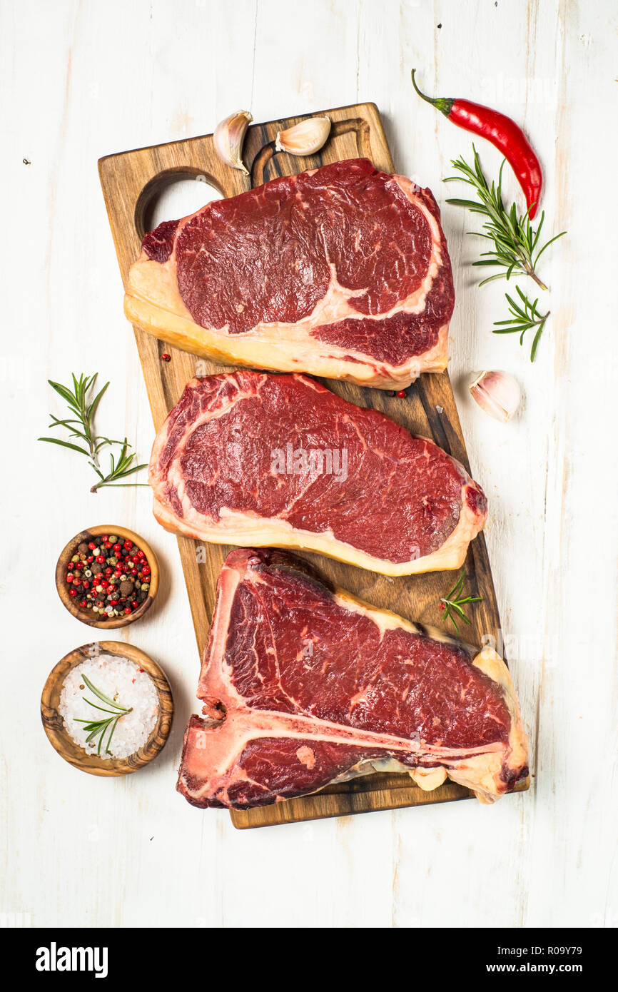 Raw meat beef steak. Black angus prime meat set ribeye, striploin, t