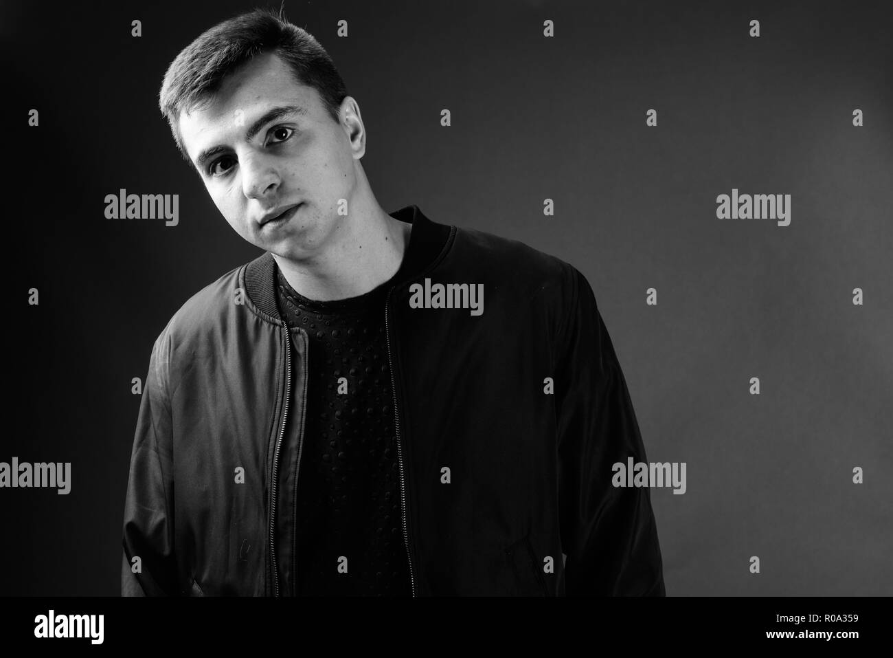 Studio Shot Of Young Handsome Man In Black And White Stock Photo Alamy