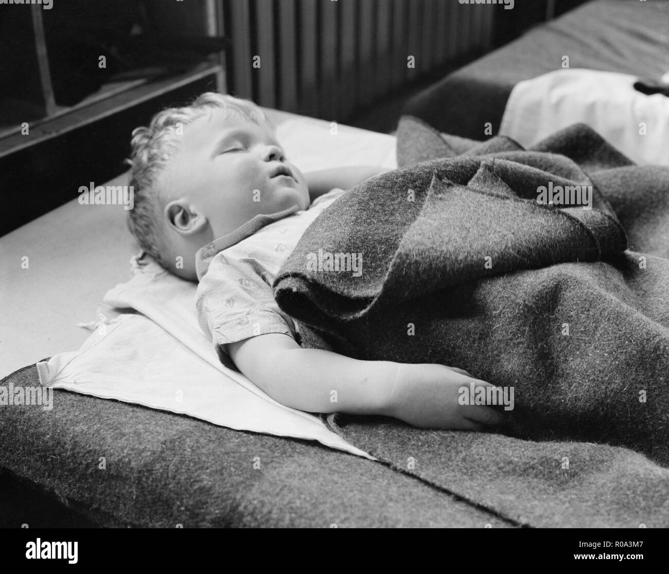 Sleeping Boy at Nursery School, Reedsville, West Virginia, USA, Elmer Johnson, Farm Security Administration, April 1935 Stock Photo