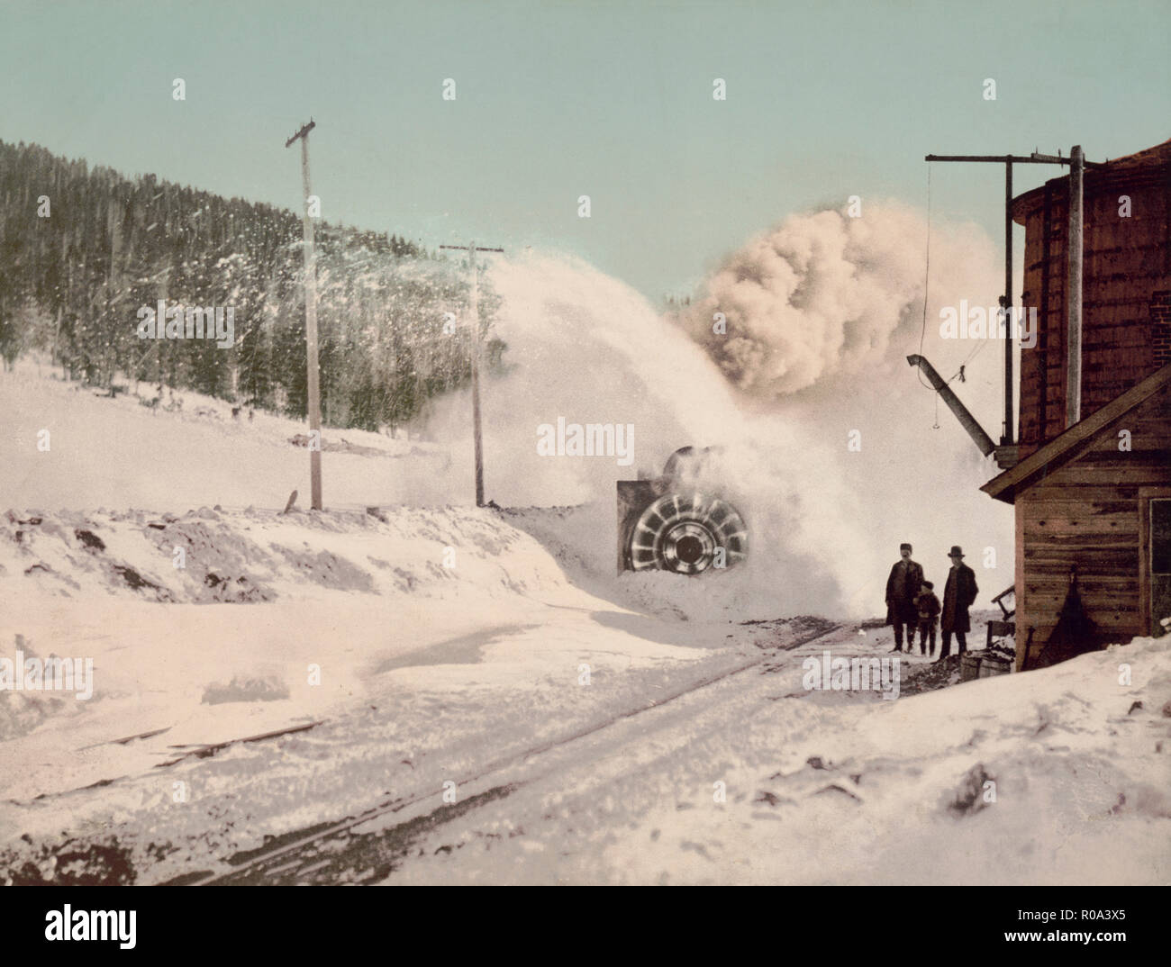 Colorado Midland Railway Train with Rotary Snow Plow Removing Snow from Tracks next to Water Tower, Hagerman Pass, Colorado, USA, William Henry Jackson for Detroit Publishing Company, 1899 Stock Photo