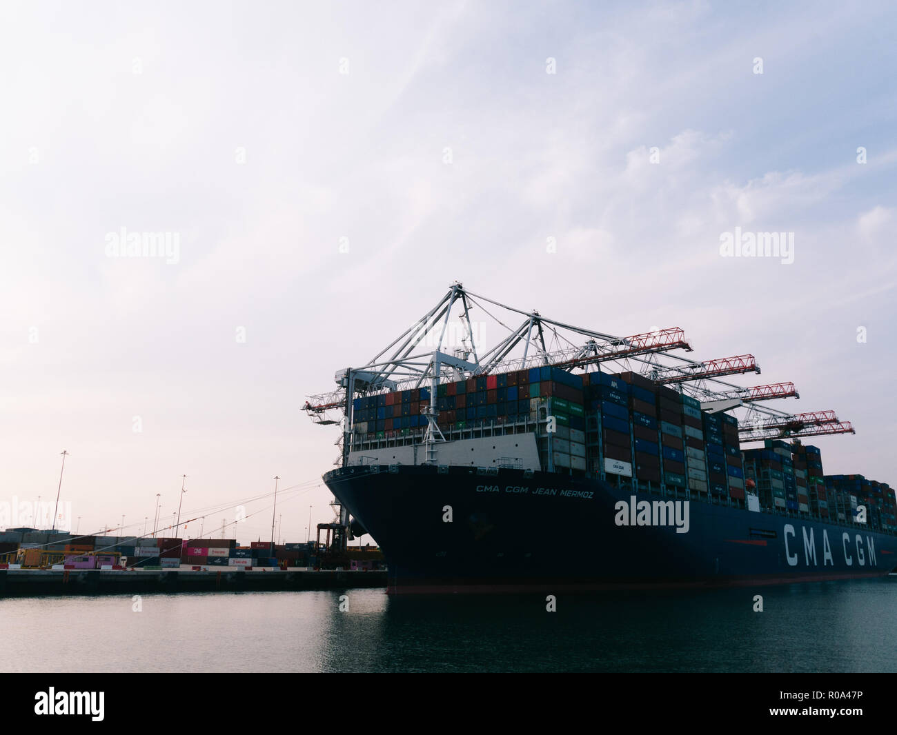 Cargo boats in Southampton docks port, going ashore Stock Photo Alamy