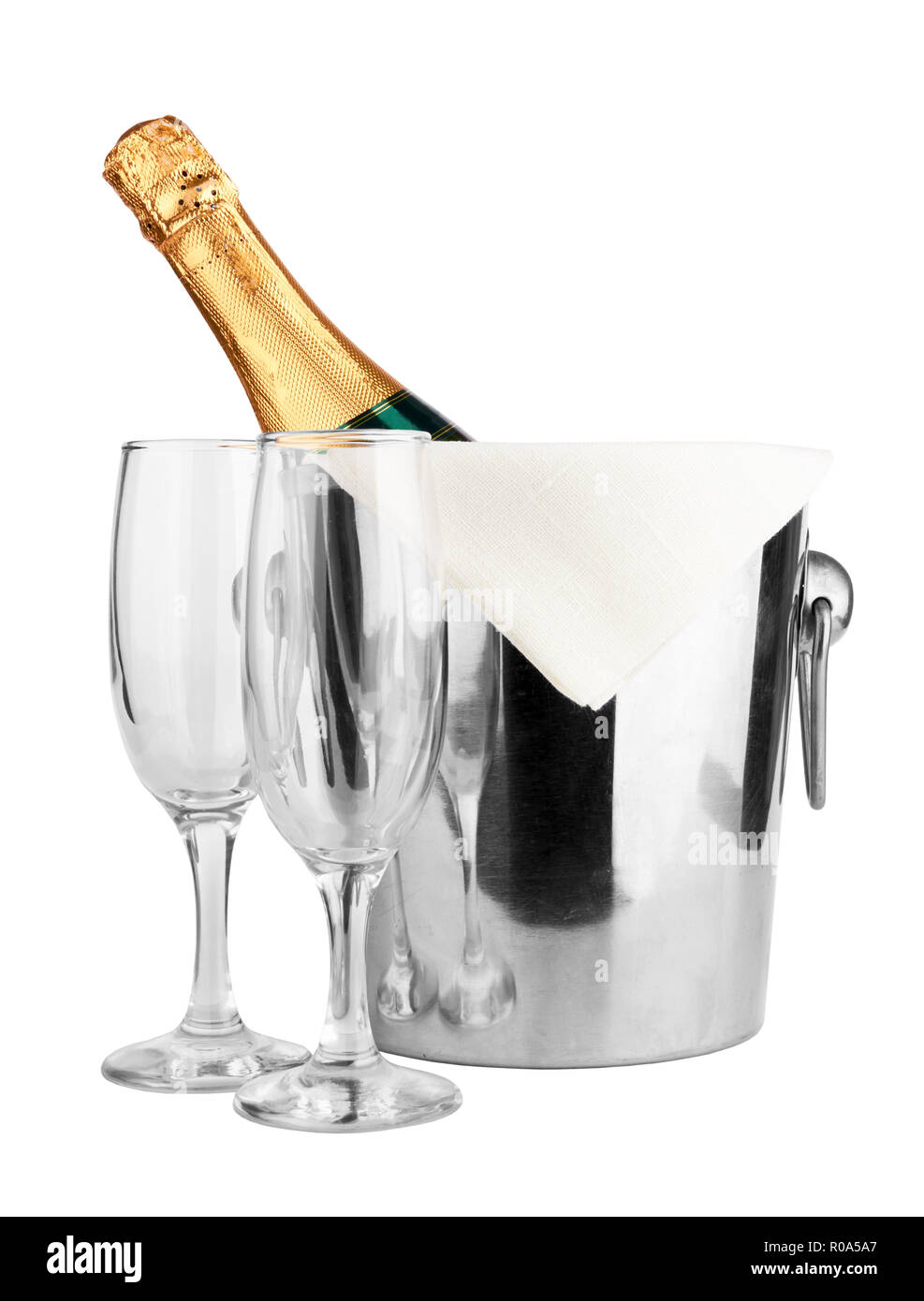 Champagne bottle in cooler and two champagne glasses Stock Photo