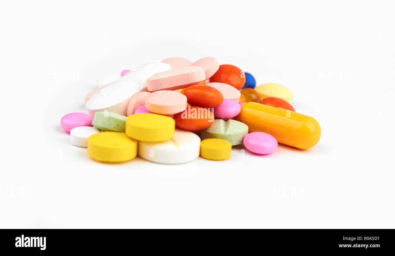 vitamins, pills and tablets on a white background Stock Photo