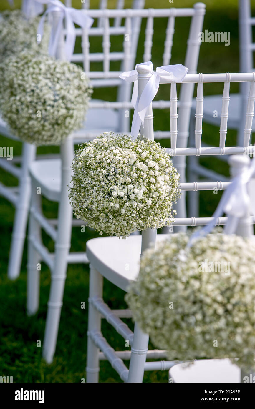 Summer Outdoor Wedding Ceremony Decoration White Chairs Decorated