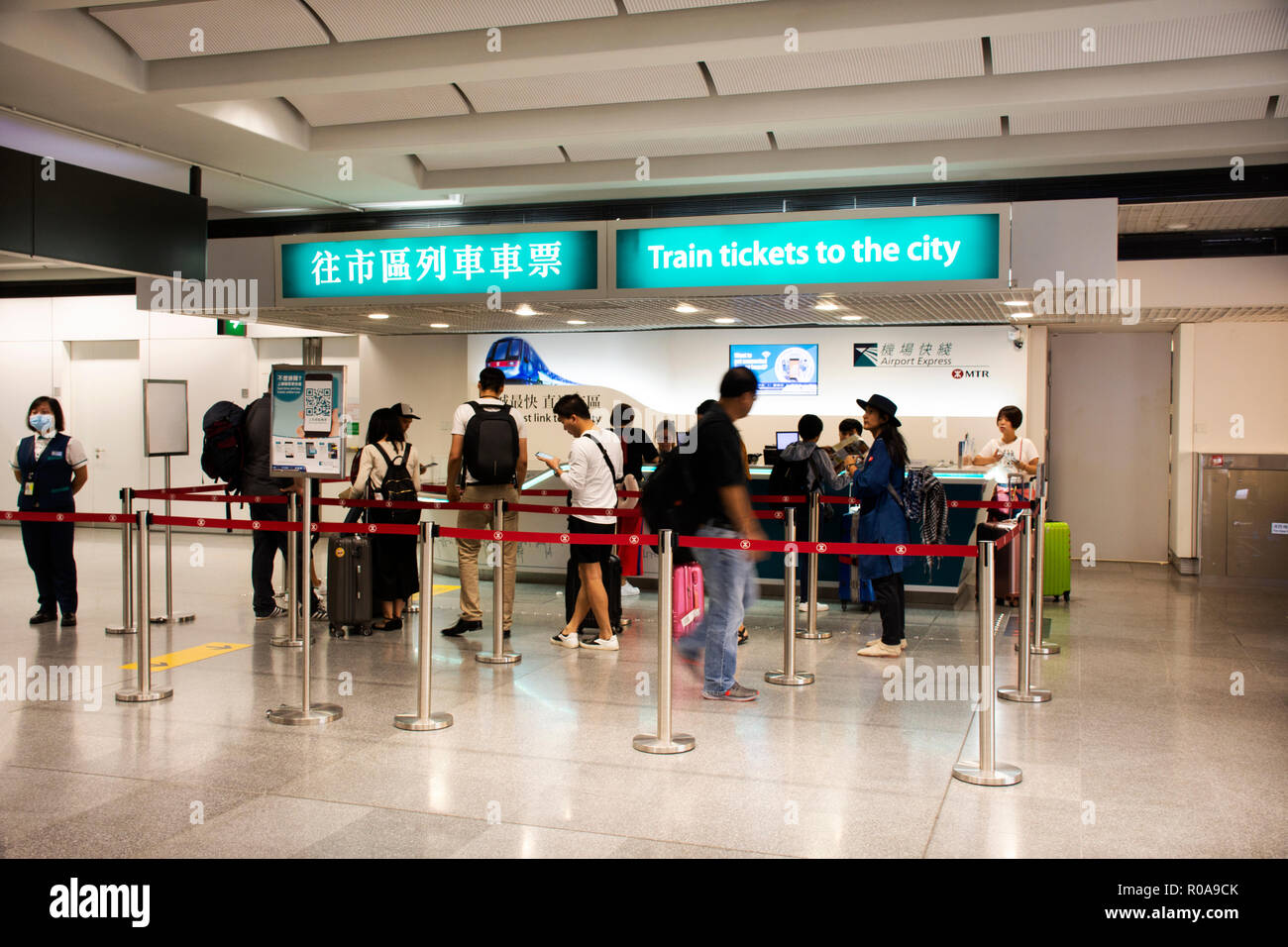 Chinese people and foreigner traveler waiting line up buy Buses ticket