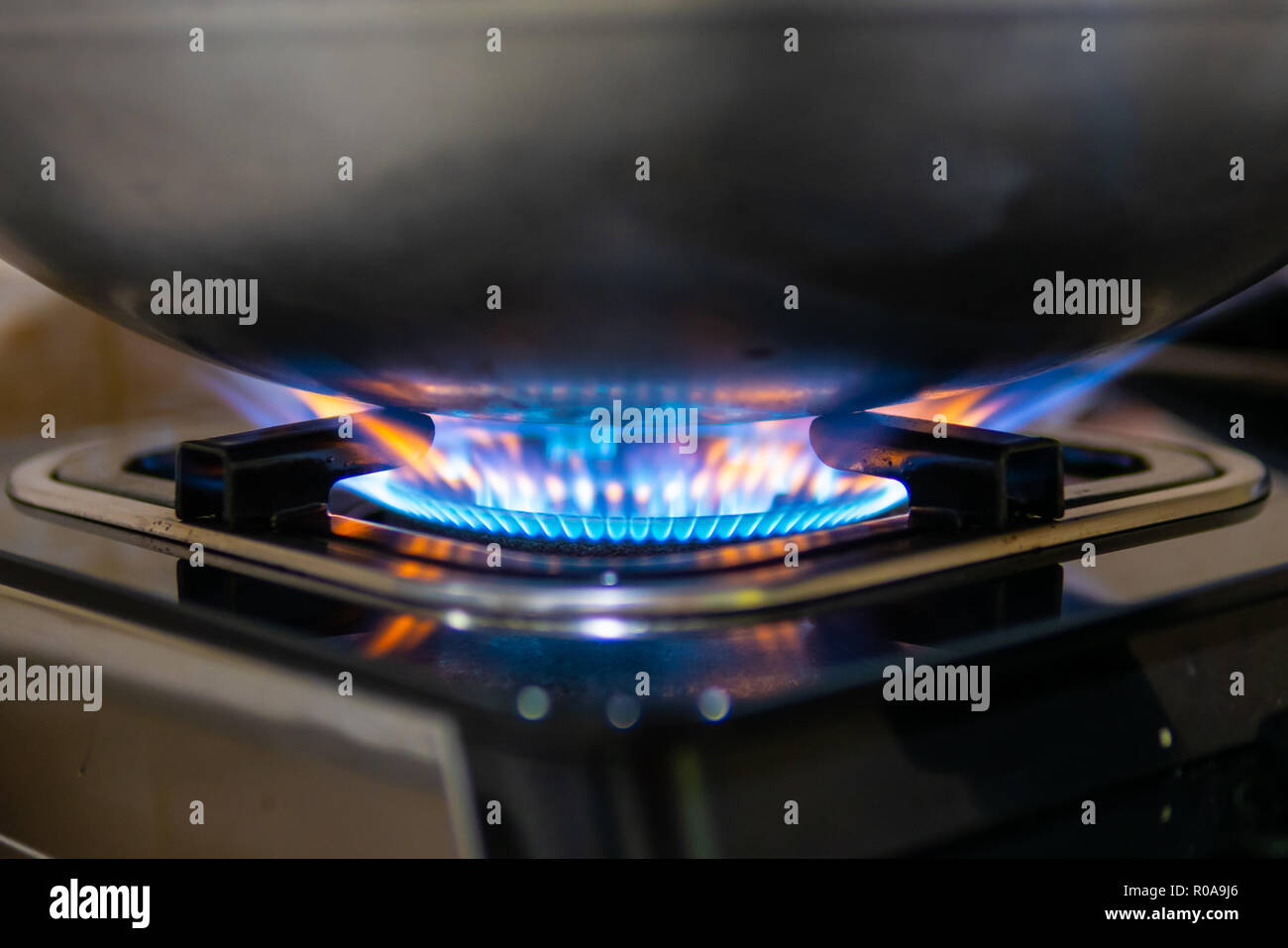 Blue Flame From Gas Stove Heating Frying Pan When Cooking Food Stock Photo Alamy