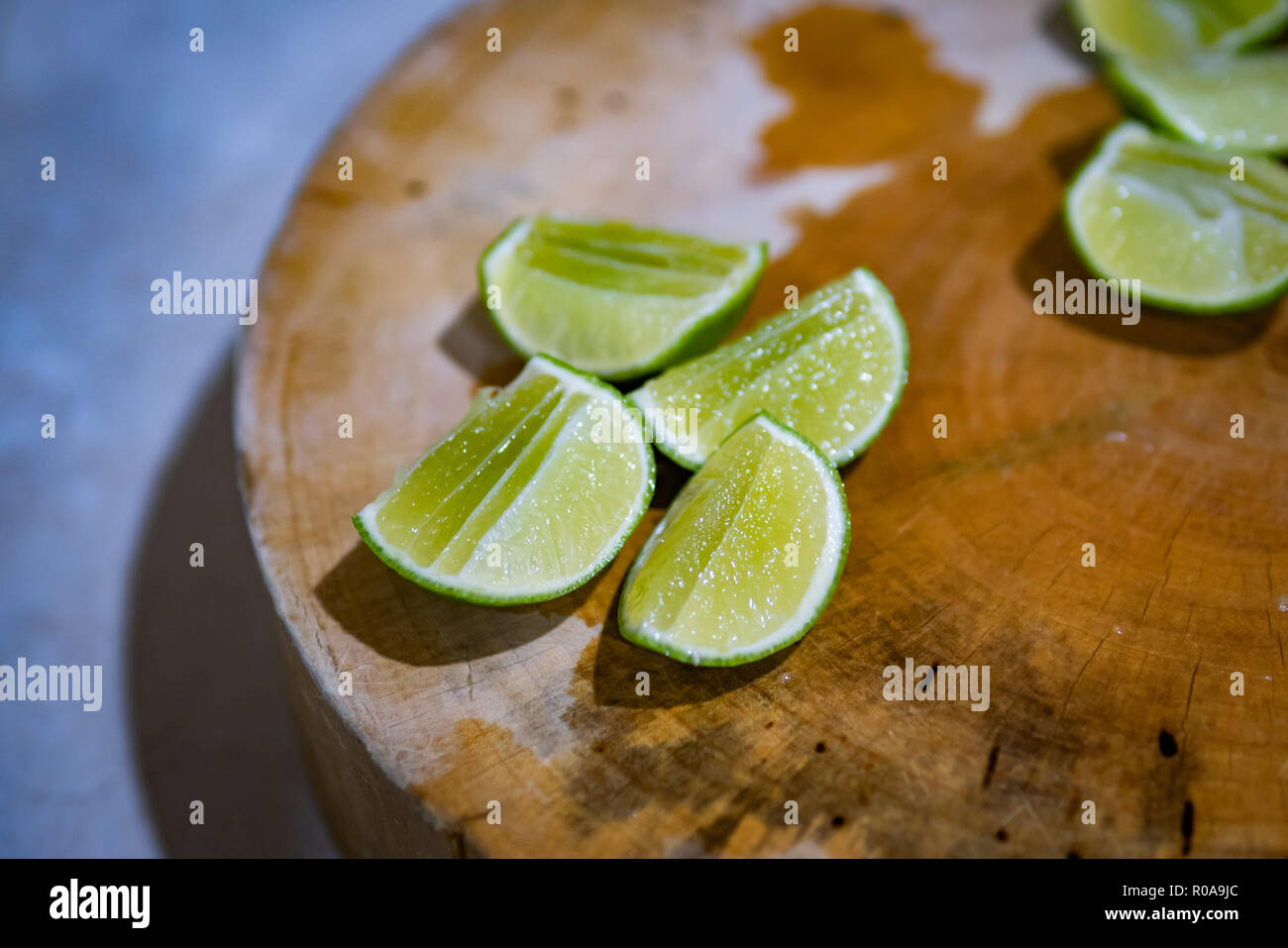 Lime on chopping block Stock Photo
