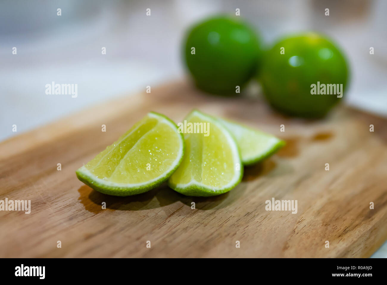 Lime on chopping block Stock Photo
