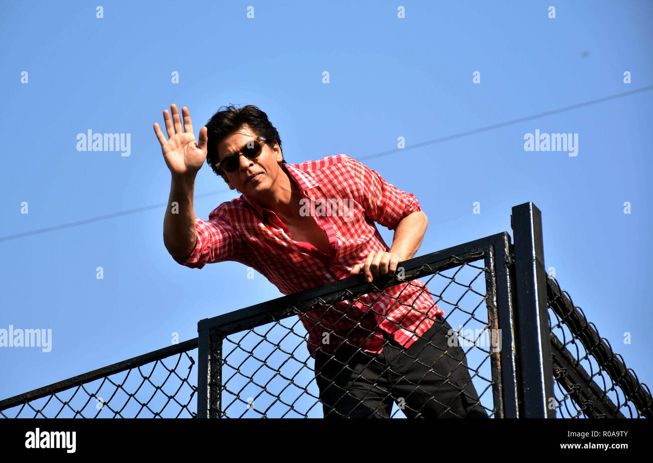 Indian actor Shahrukh Khan waves to his fans on 53rd birthday at Mannat, Bandrra in Mumbai. Stock Photo