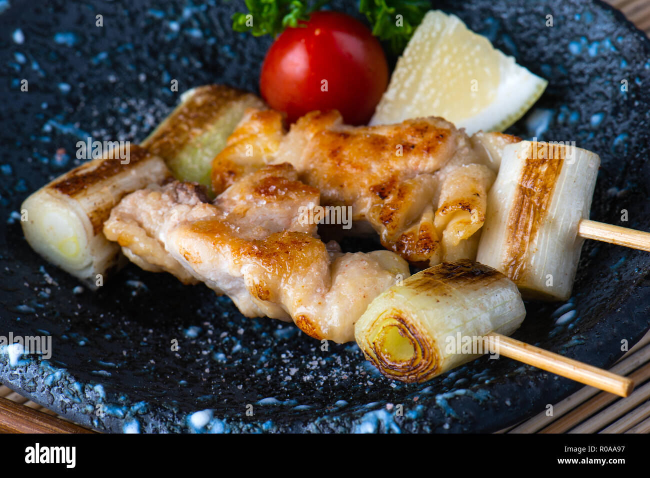 Japanese grilled chicken with salt or Yaki tori  serve in Japanese food style. Stock Photo