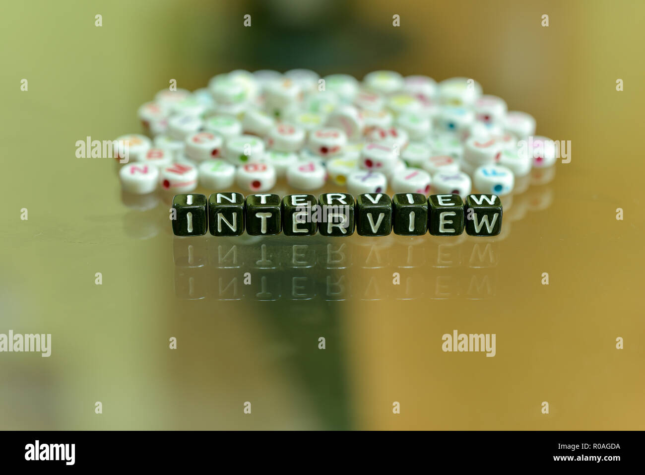 INTERVIEW written with Acrylic Black cube with white Alphabet Beads on ...