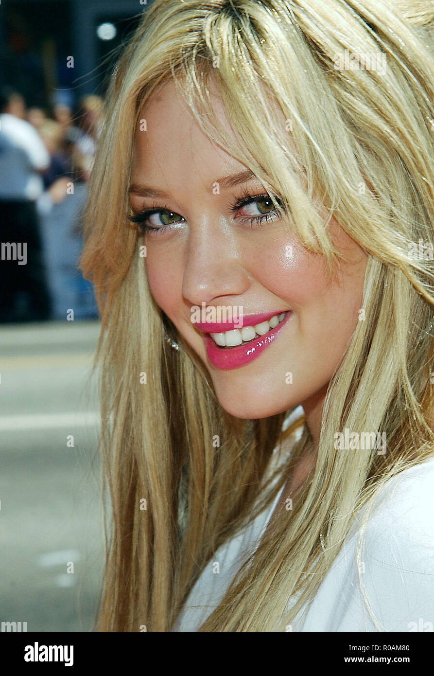 Hilary Duff arriving at a Cinderella Story Premiere at the Chinese Theatre in Los Angeles. July 10, 2004DuffHilary181 Red Carpet Event, Vertical, USA, Film Industry, Celebrities,  Photography, Bestof, Arts Culture and Entertainment, Topix Celebrities fashion /  Vertical, Best of, Event in Hollywood Life - California,  Red Carpet and backstage, USA, Film Industry, Celebrities,  movie celebrities, TV celebrities, Music celebrities, Photography, Bestof, Arts Culture and Entertainment,  Topix, headshot, vertical, one person,, from the year , 2004, inquiry tsuni@Gamma-USA.com Stock Photo