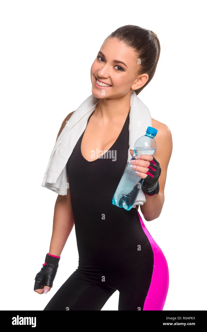 Sportswoman holding bottle of water Stock Photo - Alamy
