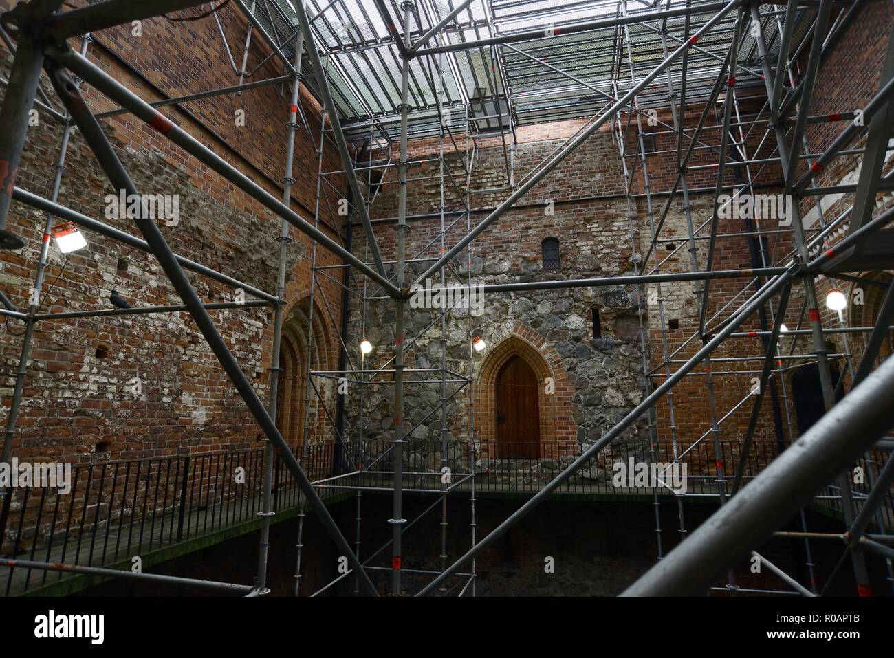 scaffolding for the restoration of the walls of a medieval castle Stock Photo