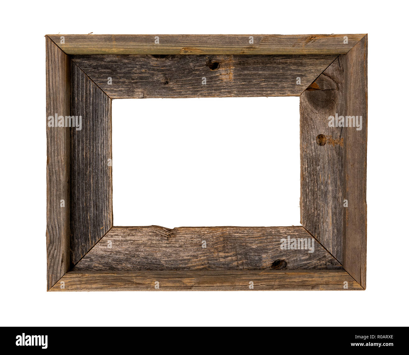 Rustic recycled wood picture frame isolated on white with clipping path at ALL sizes. Stock Photo