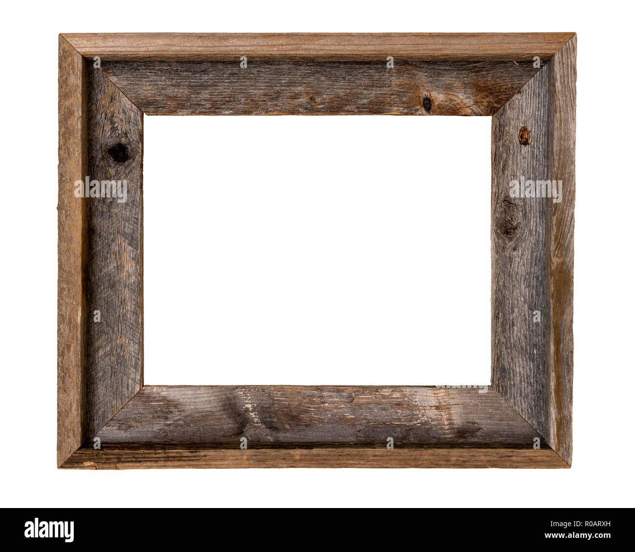 Rustic recycled wood picture frame isolated on white with clipping path at ALL sizes. Stock Photo