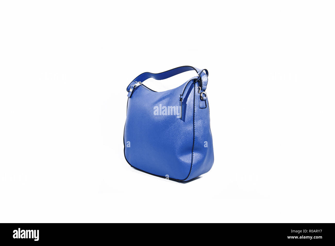 Empty blue ladies handbag isolated on white background. Stock Photo