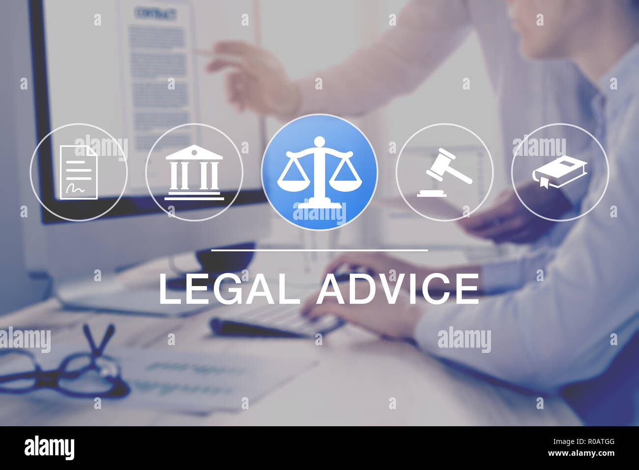 Legal advice and lawyer consulting service, concept with icons of justice, court, law, contract and in background two consultant working on document o Stock Photo