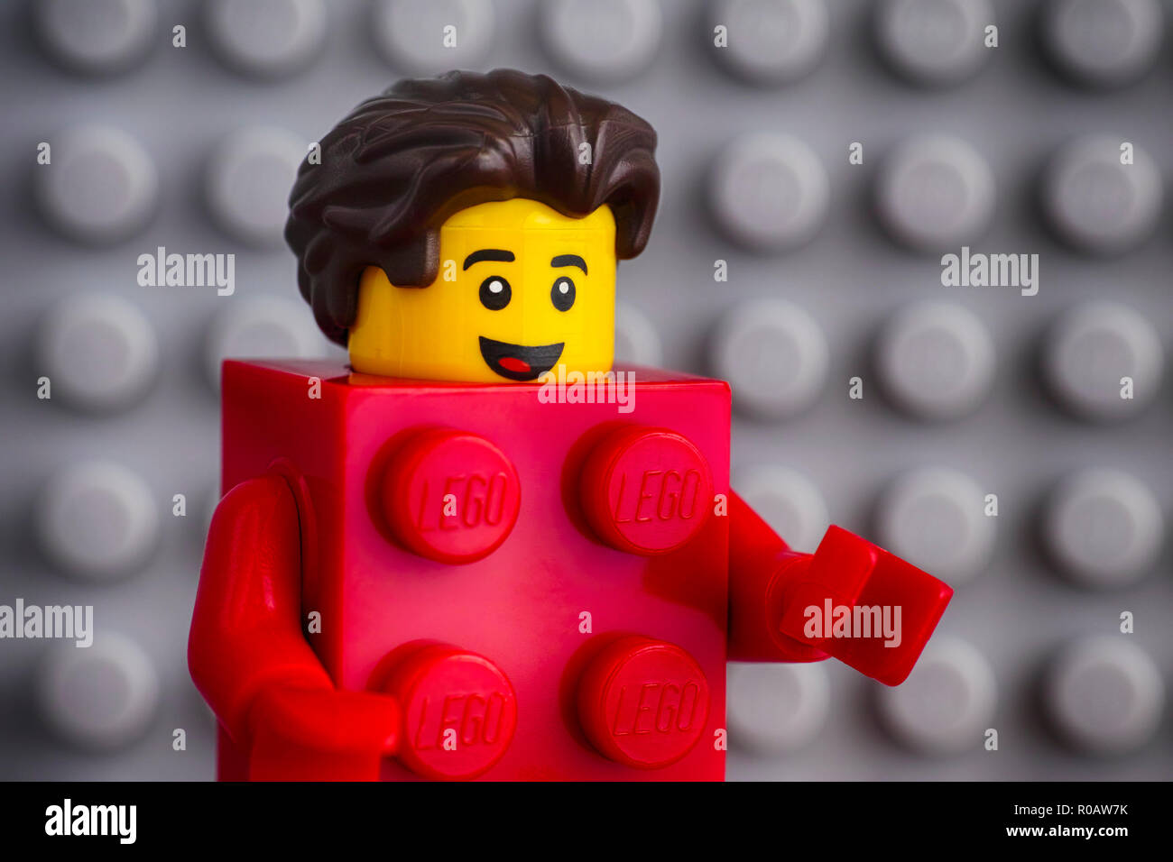 Tambov Russian Federation July 29 2018 Lego Red Suit Brick Guy Minifigure Against Gray Baseplate Background Studio Shot Stock Photo Alamy alamy