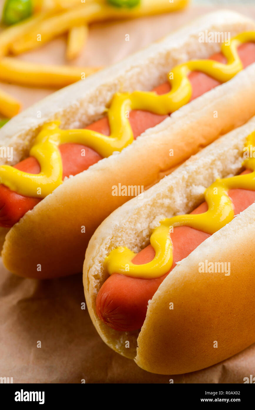 French fries and mustard topping Stock Photo Alamy