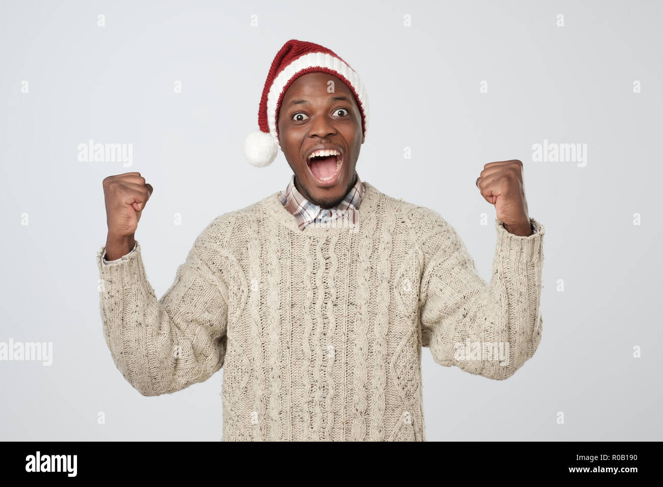Handsome christmas man is posing in studio Stock Photo