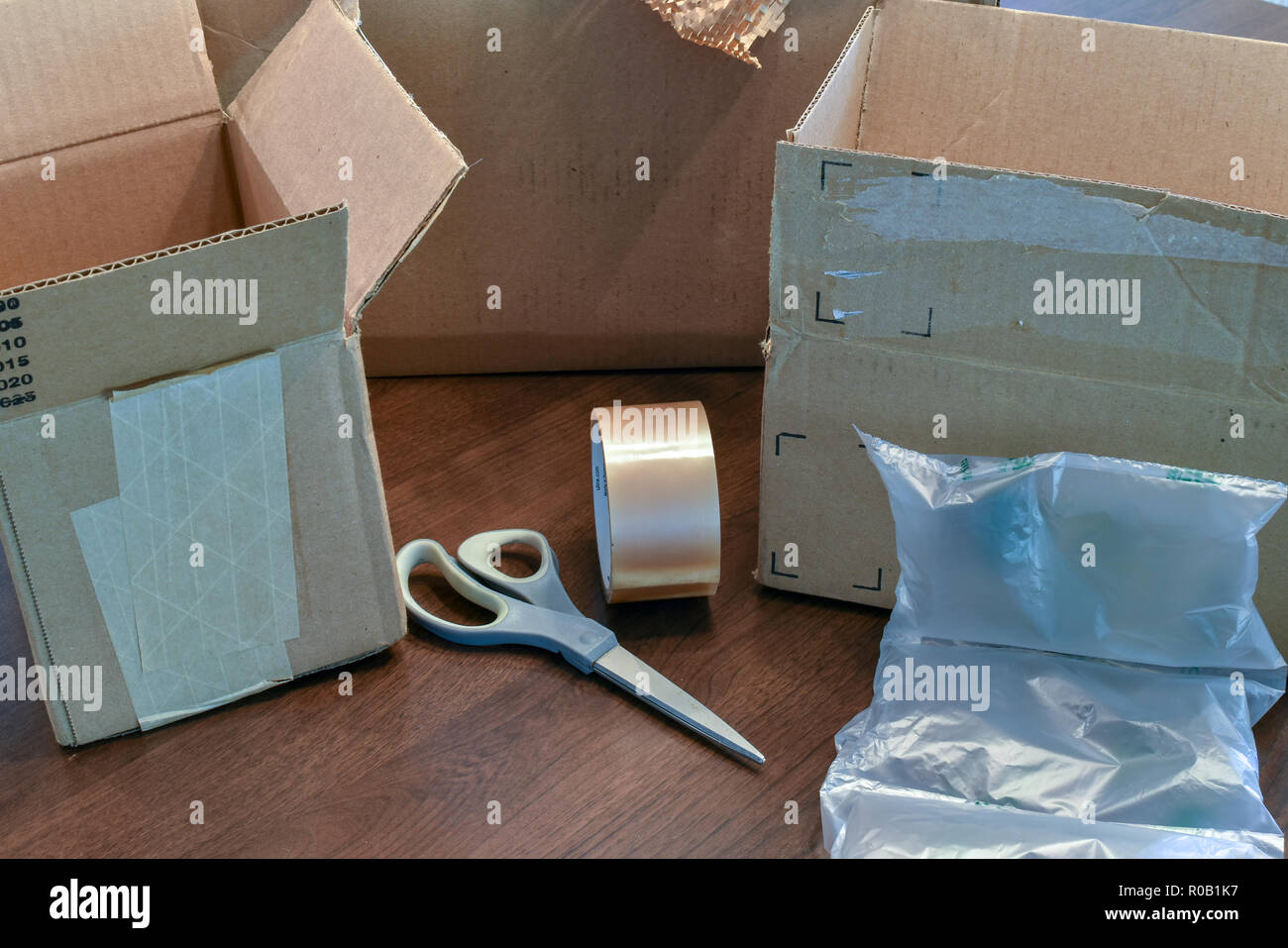 Packaging materials and supplies on a table Stock Photo
