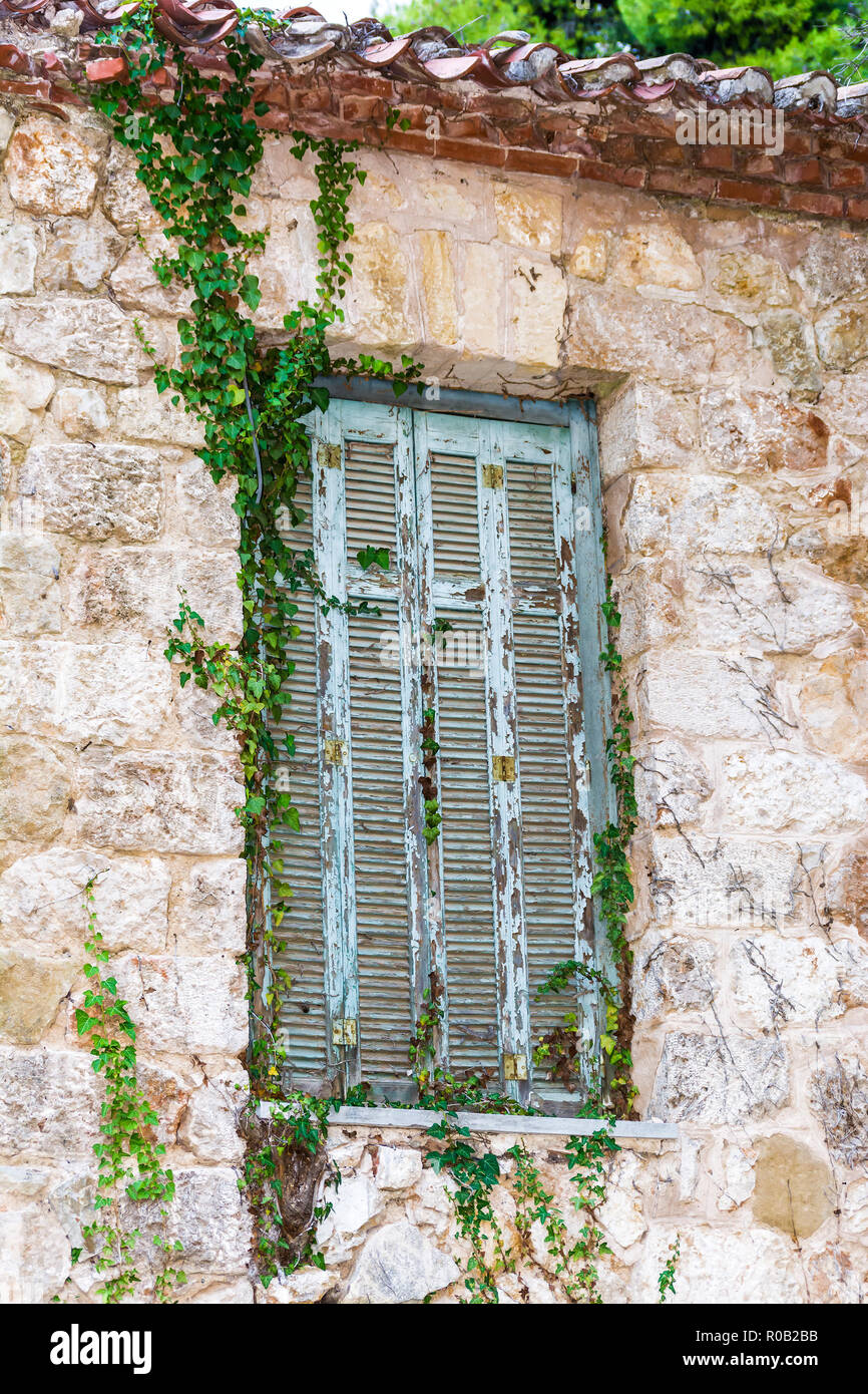 Old window details of Tatoi Palace which is a former Greek Royal Family summer residence and birthplace of King George II of Greece. Stock Photo