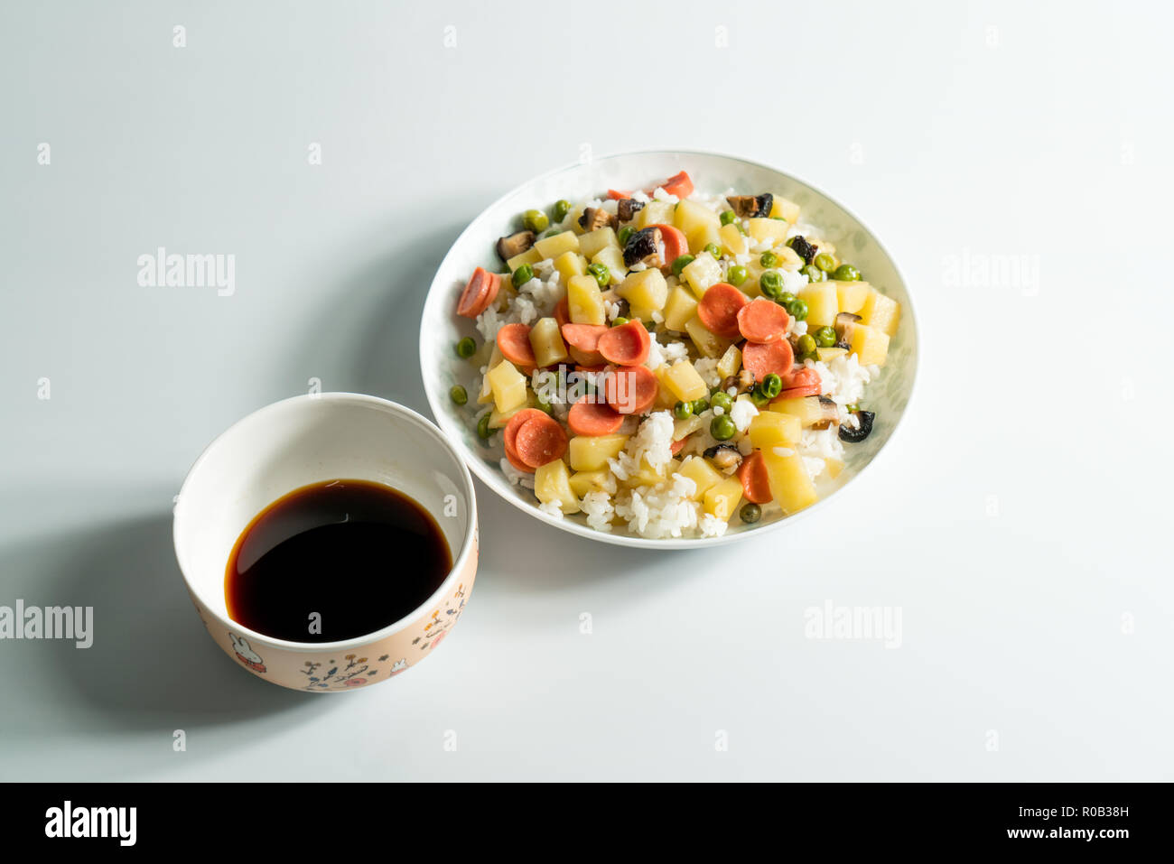Fried rice and wooden background Stock Photo