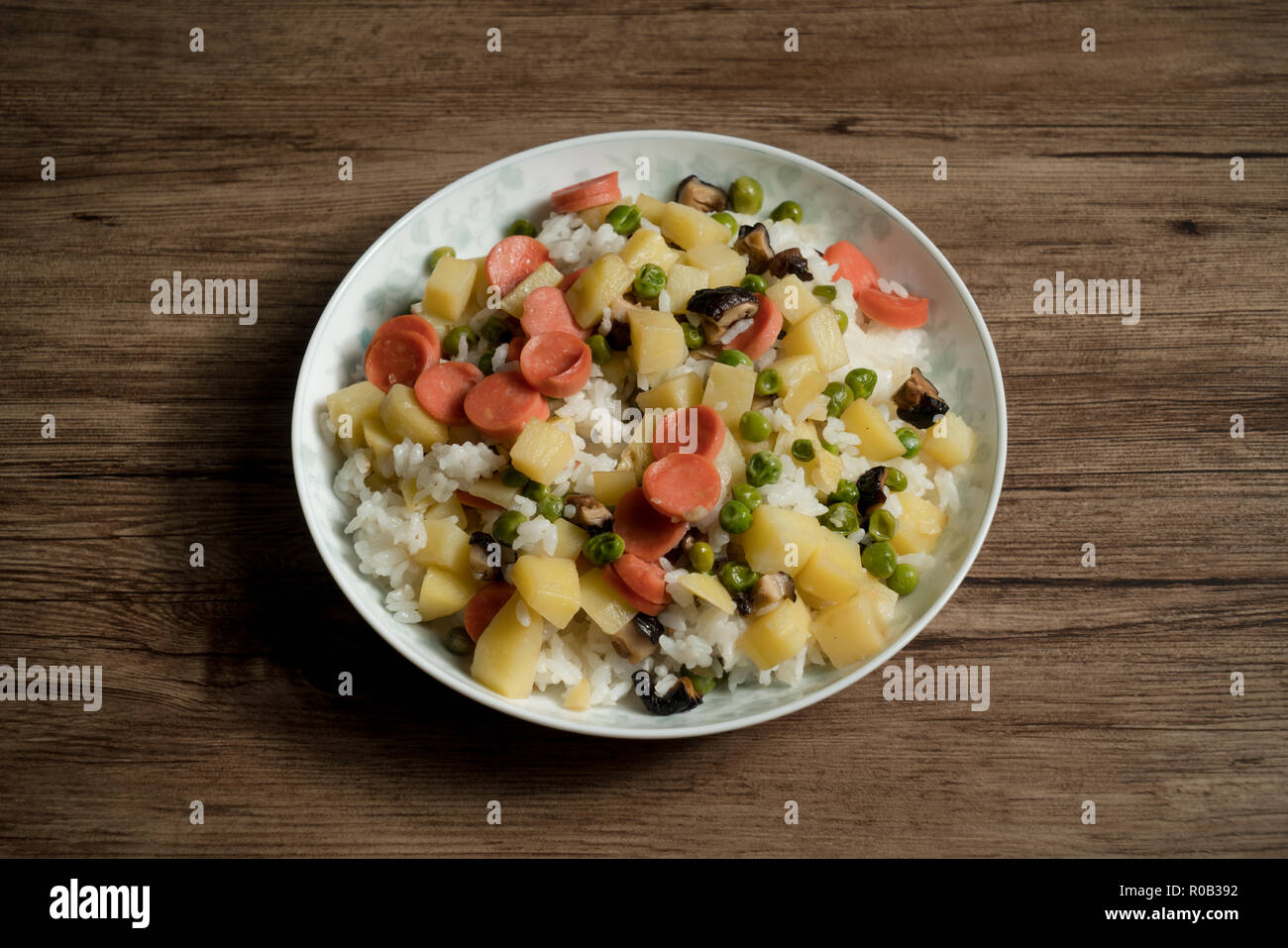 Fried rice and wooden background Stock Photo