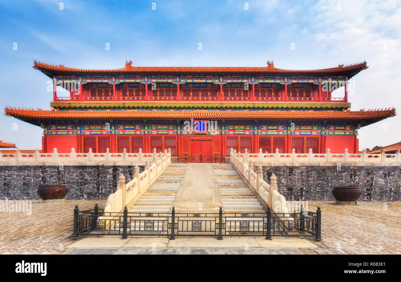 Forbidden city palace complex in Beijing, China, front facade view of the temple's entrance with stairs and locked doors above stone basement. Stock Photo