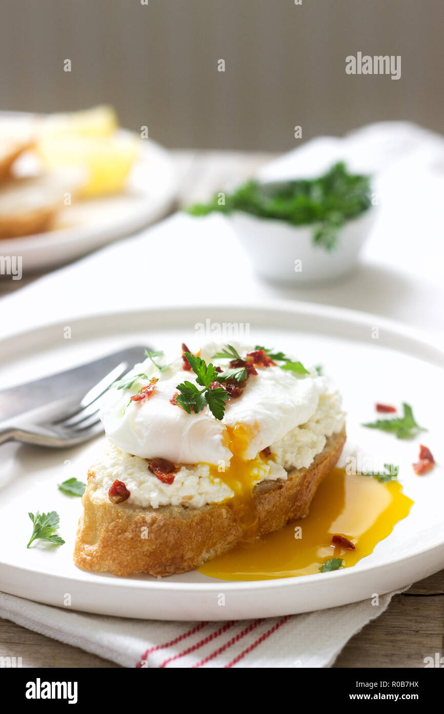 Crispy Baguette Toasts With Cottage Cheese Poached Egg And Dried