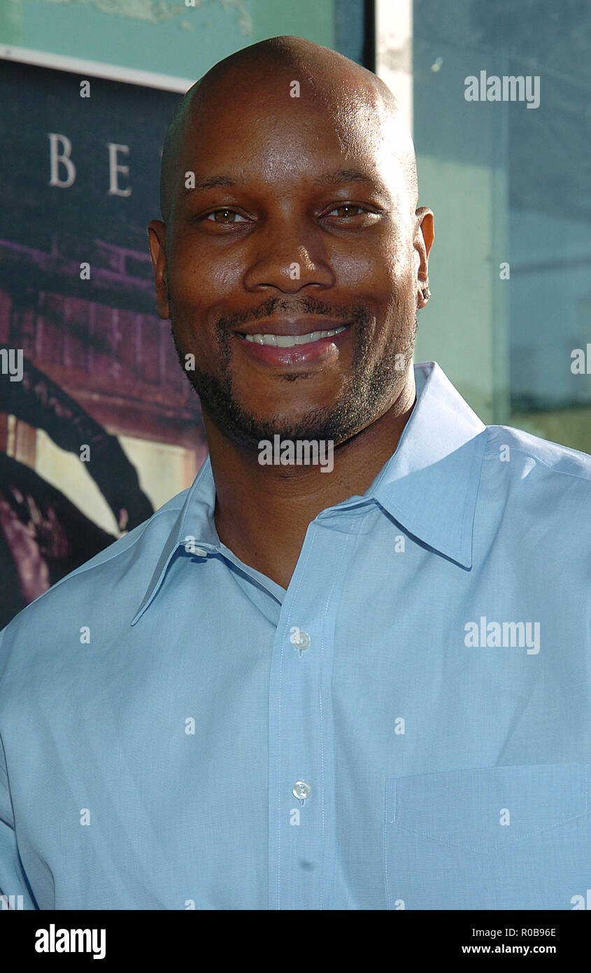 Dwayne Adway arriving at the Catwoman Premiere at the Cinerama Dome ...