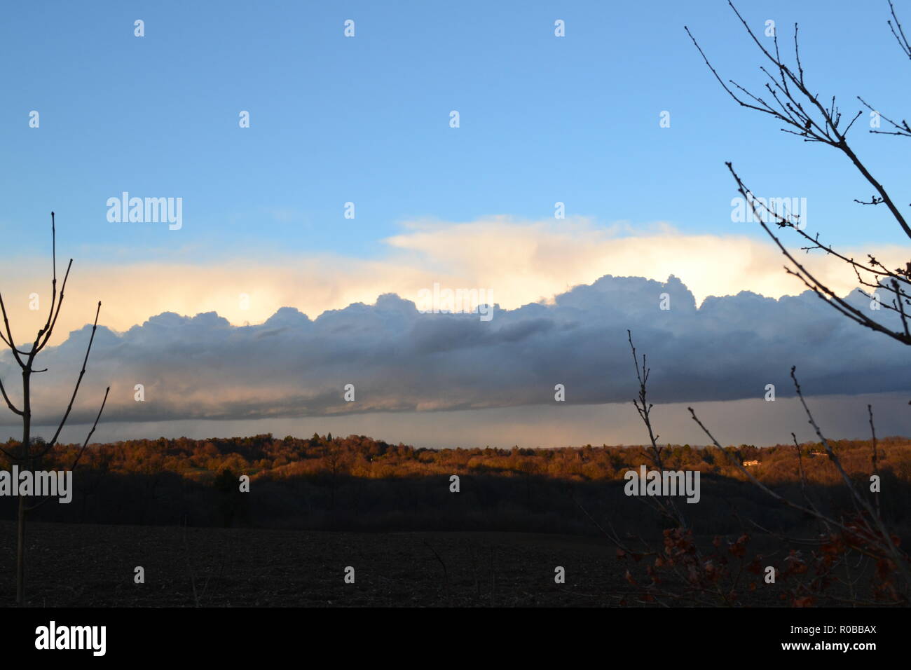 A day with dramatic clouds and wintry showers, February 2018, in Kent, UK, at One Tree Hill on the North Downs' Greensand Ridge, near Sevenoaks Stock Photo