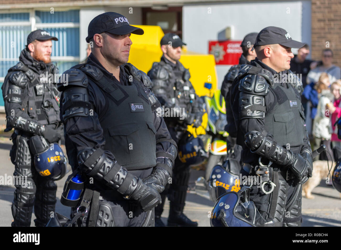 Black police woman body armour hi-res stock photography and images - Alamy